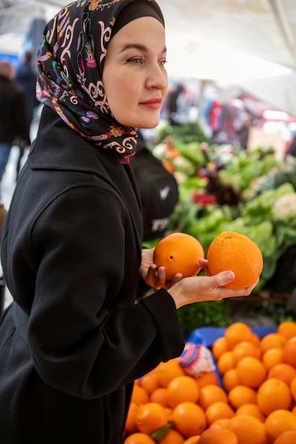 Woman shopping for ramadan side view