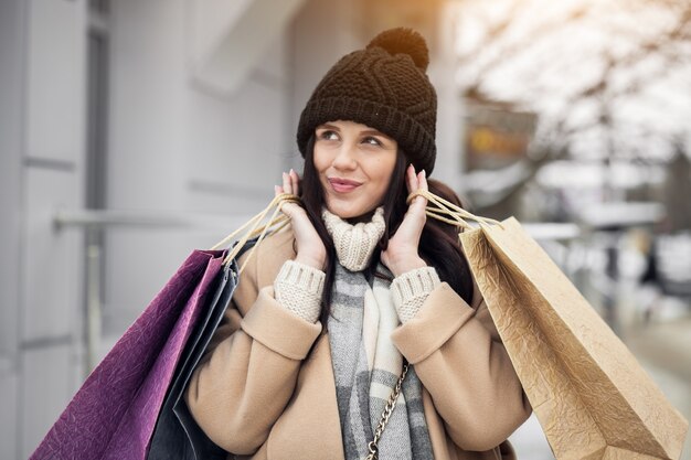 woman shopping street smiling winter