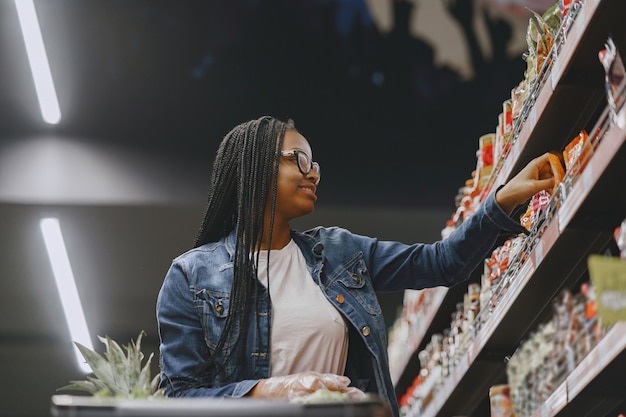 Woman shopping vegetables at the supermarket