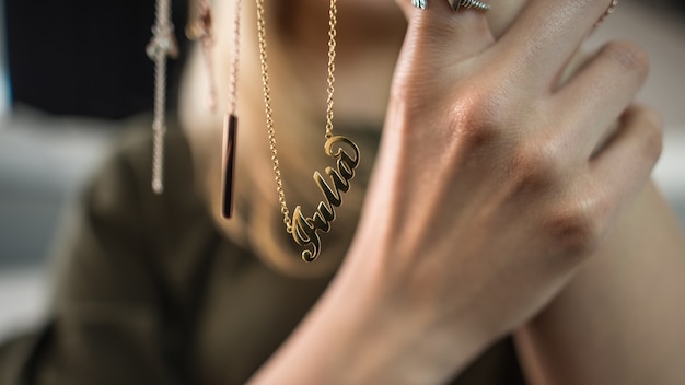 Woman showcasing jewelry on her hands