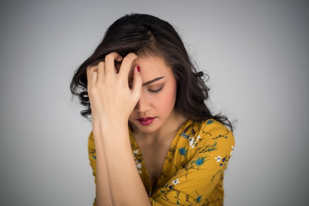 woman showing acting headache or stress