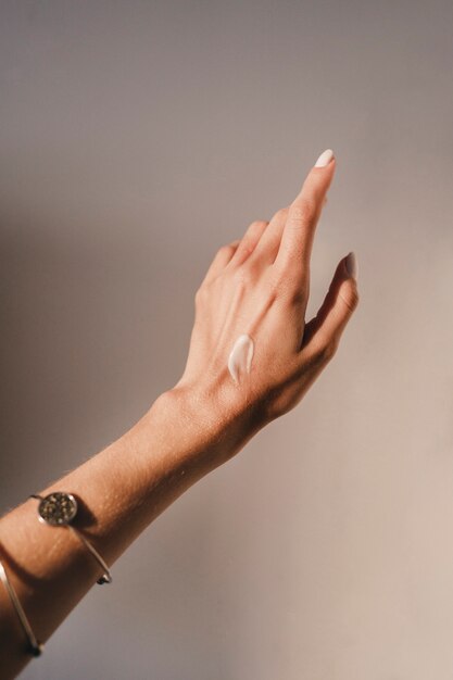 Woman showing hands in form of support