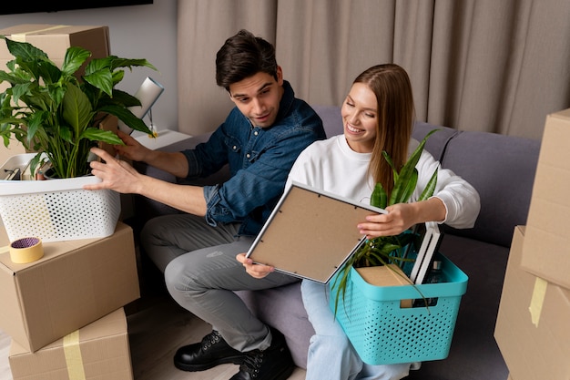 Woman showing her boyfriend a frame