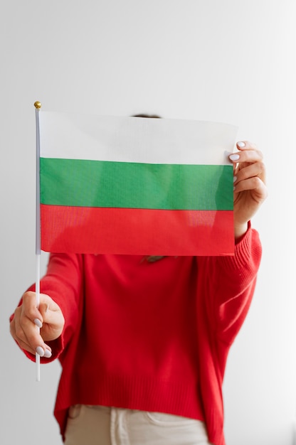 Woman showing off the bulgarian flag