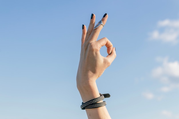 Woman showing ok gesture