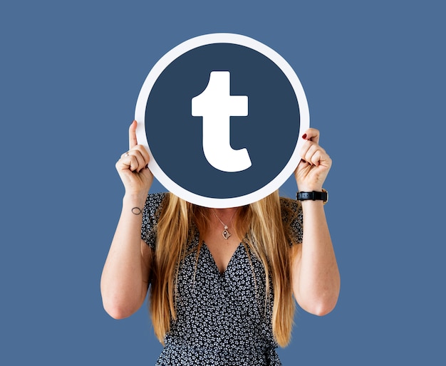 Woman showing a Tumblr icon