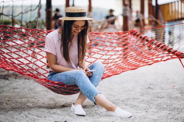 Woman sitting at the beach