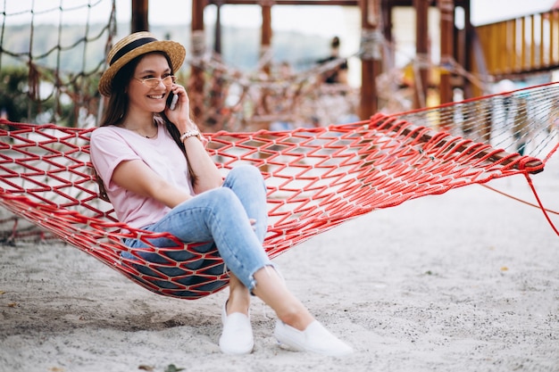 Woman sitting at the beach