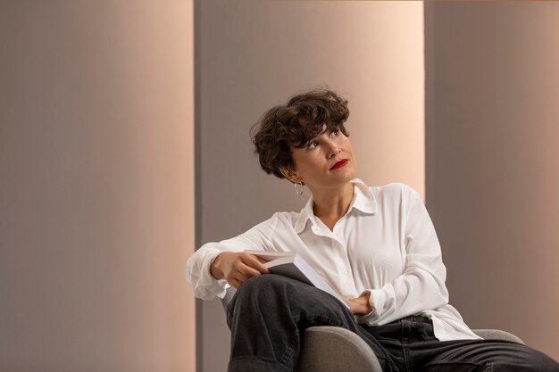 Woman sitting on chair medium shot