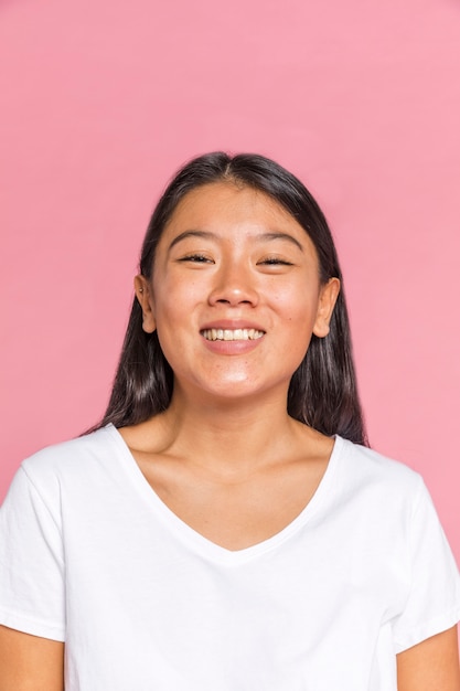 Woman smiling and looking at camera