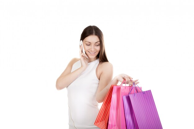 Woman smiling while talking on her phone