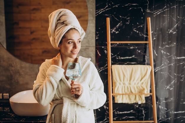 Woman at spa going to take a bath