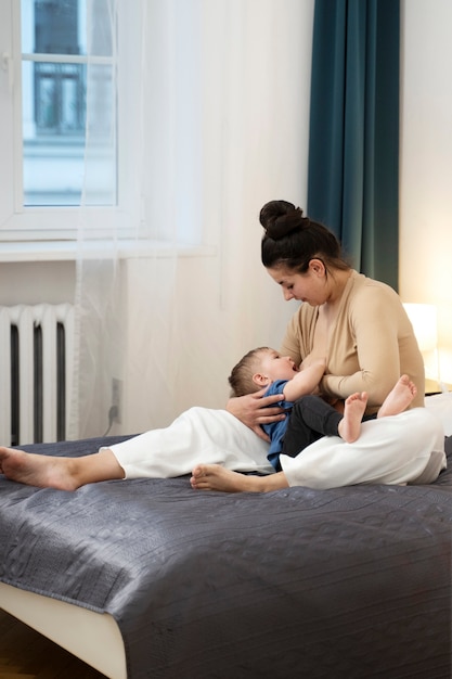 Woman spending time with child after breast feeding