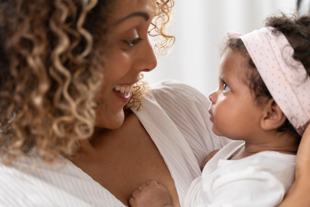 Free photo woman spending time with her baby girl