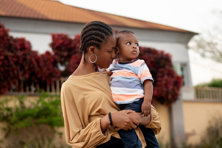 Free Photo woman spending time with her black baby boy