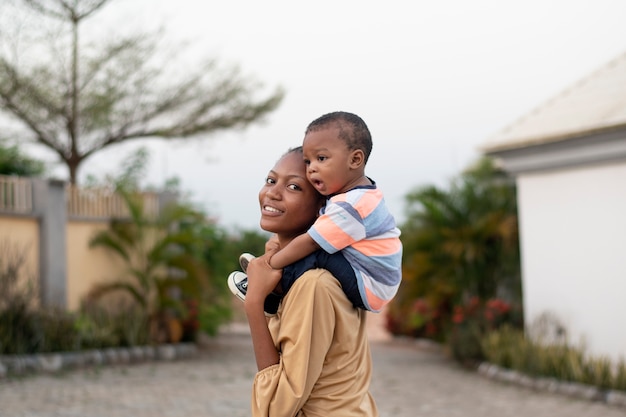 Woman spending time with her black baby boy