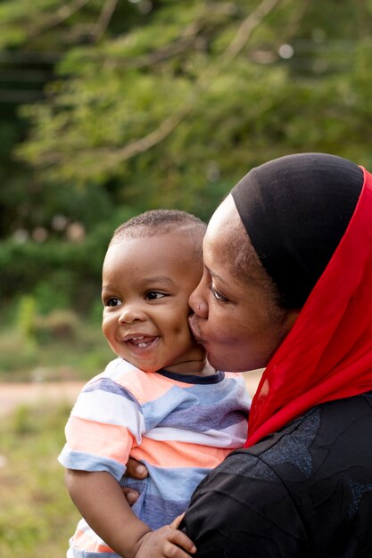 Woman spending time with her black baby boy