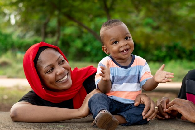 Woman spending time with her black baby boy