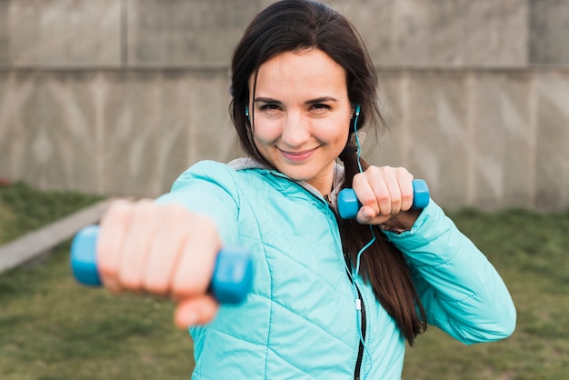 Woman in sportswear training outside