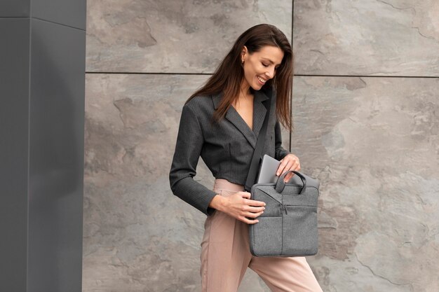 Woman standing in a clean urban space