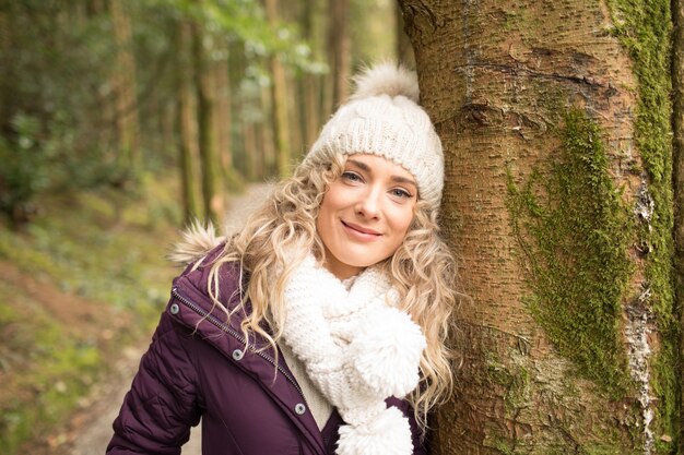 Woman standing in the forest