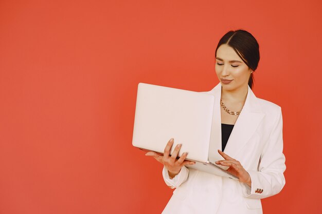 Woman standing on a red