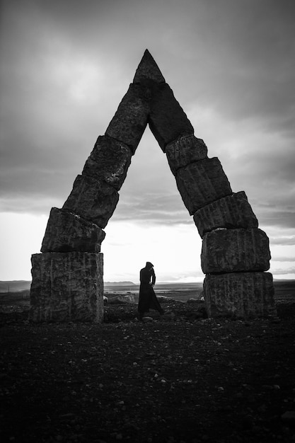 Woman standing in the ruins