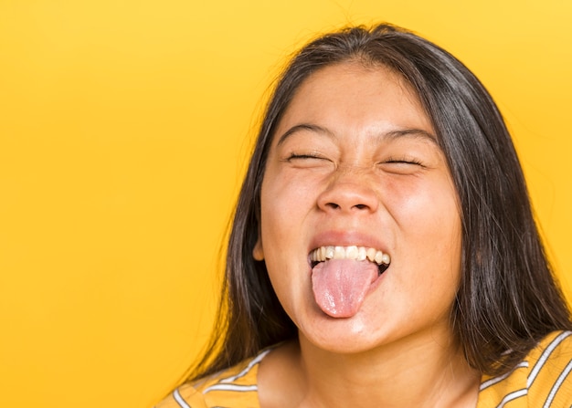 Woman sticking her tongue out