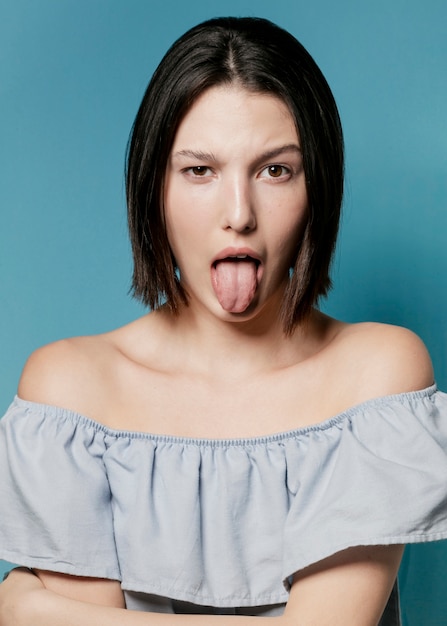 Woman sticking her tongue out