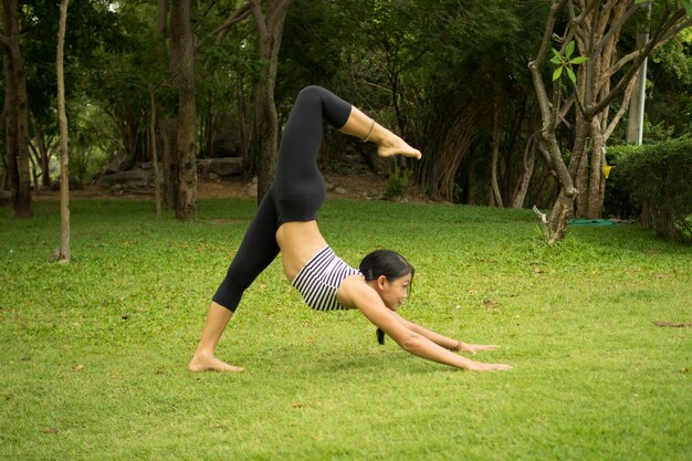 Woman stretched with one leg in the air