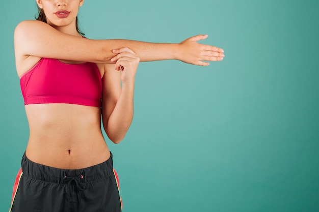 Free photo woman stretching before training