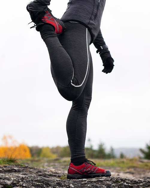 Woman stretching her body before running