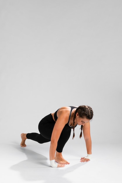 Woman stretching with copy space background