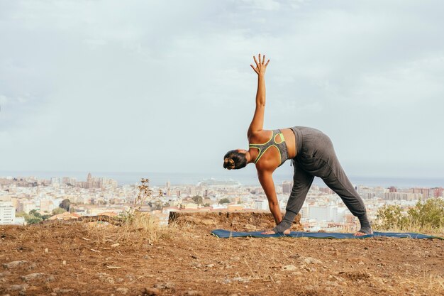 Woman stretching with yoga exercises