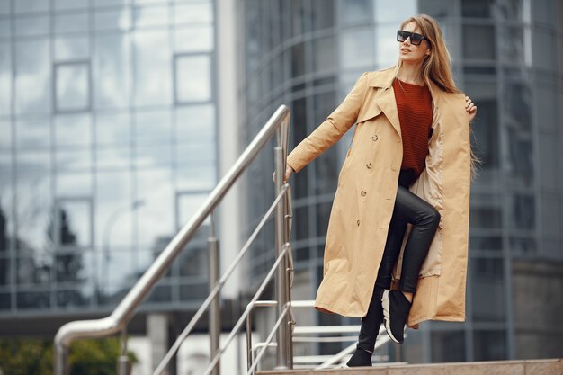 Woman in a stylish clothes in a summer city