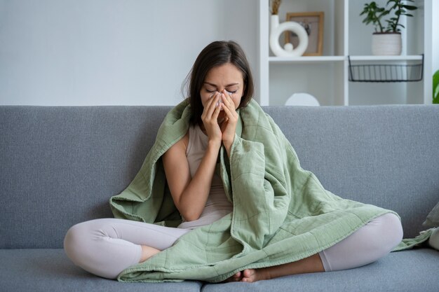 woman suffering from allergy front view