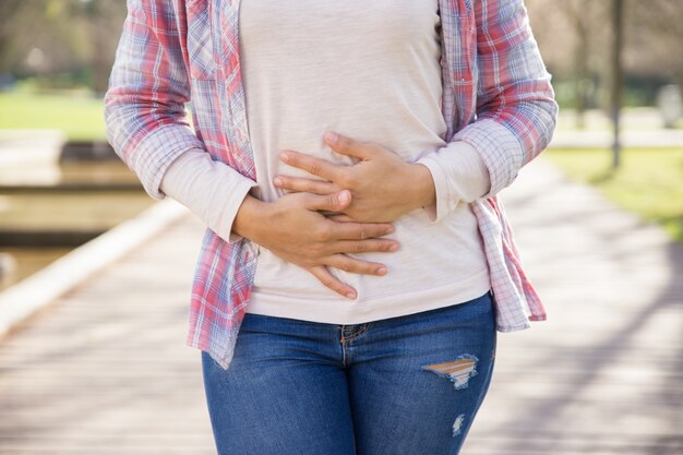 Woman suffering from bellyache