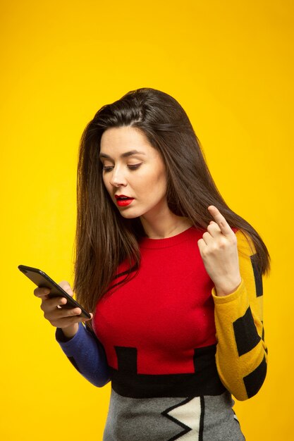 Woman surprised while talking by phone