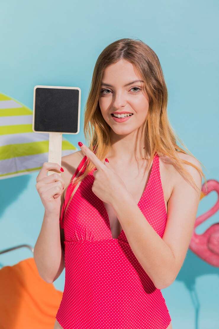 Free Photo woman in swimwear with blank sigh