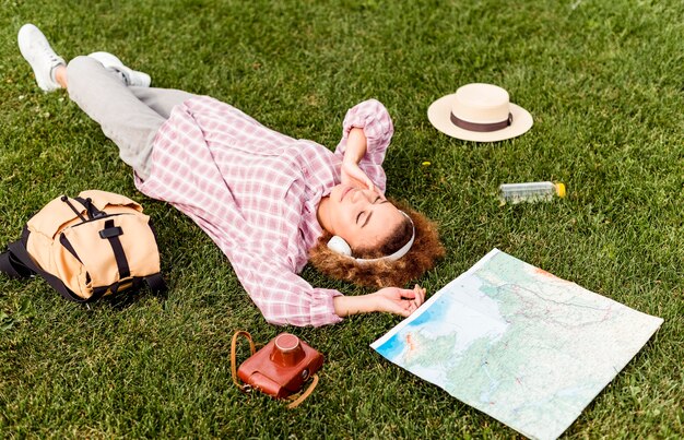 Woman taking a break after traveling outdoors