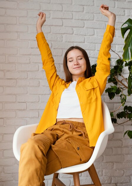 Woman taking a break from gardening