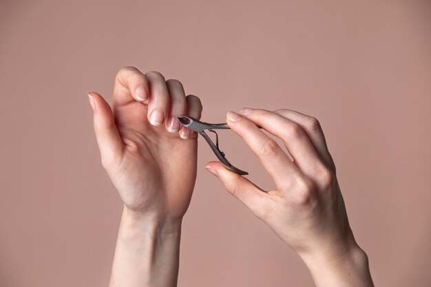 Woman taking care of her nails