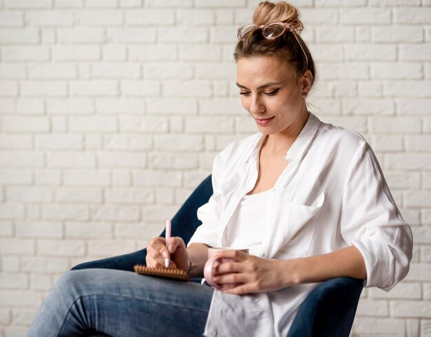 Woman taking notes