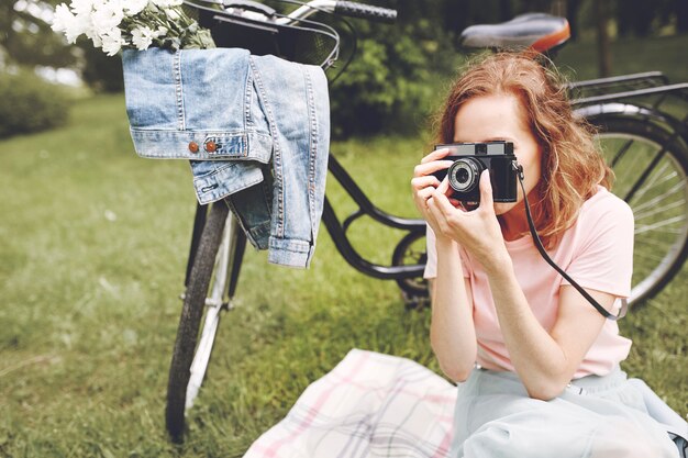 Woman taking pictures of nature