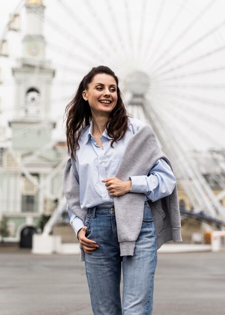 Woman taking a walk in an amusement park