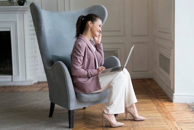 Woman talking on the phone at home