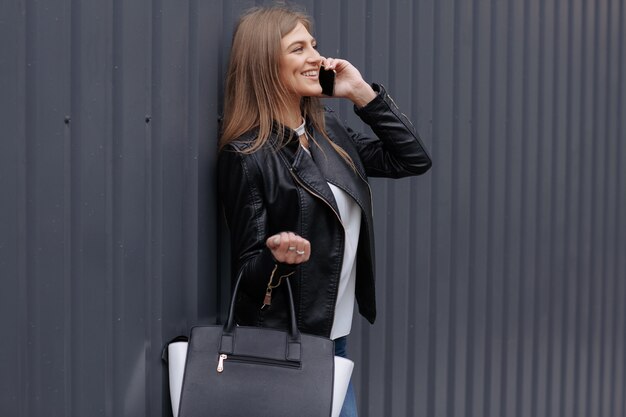 Woman talking on the phone and smiling