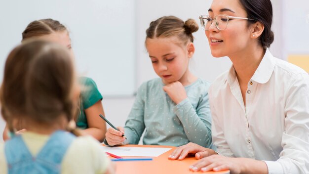 Woman talking with her students