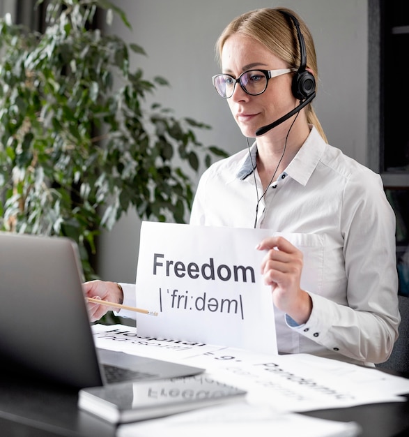 Woman teaching her students about freedom