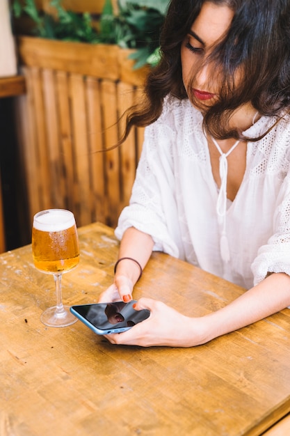 Woman texting on smartphone